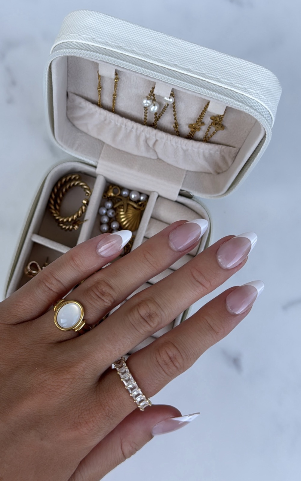 Louise Carter rings in an open jewelry box
